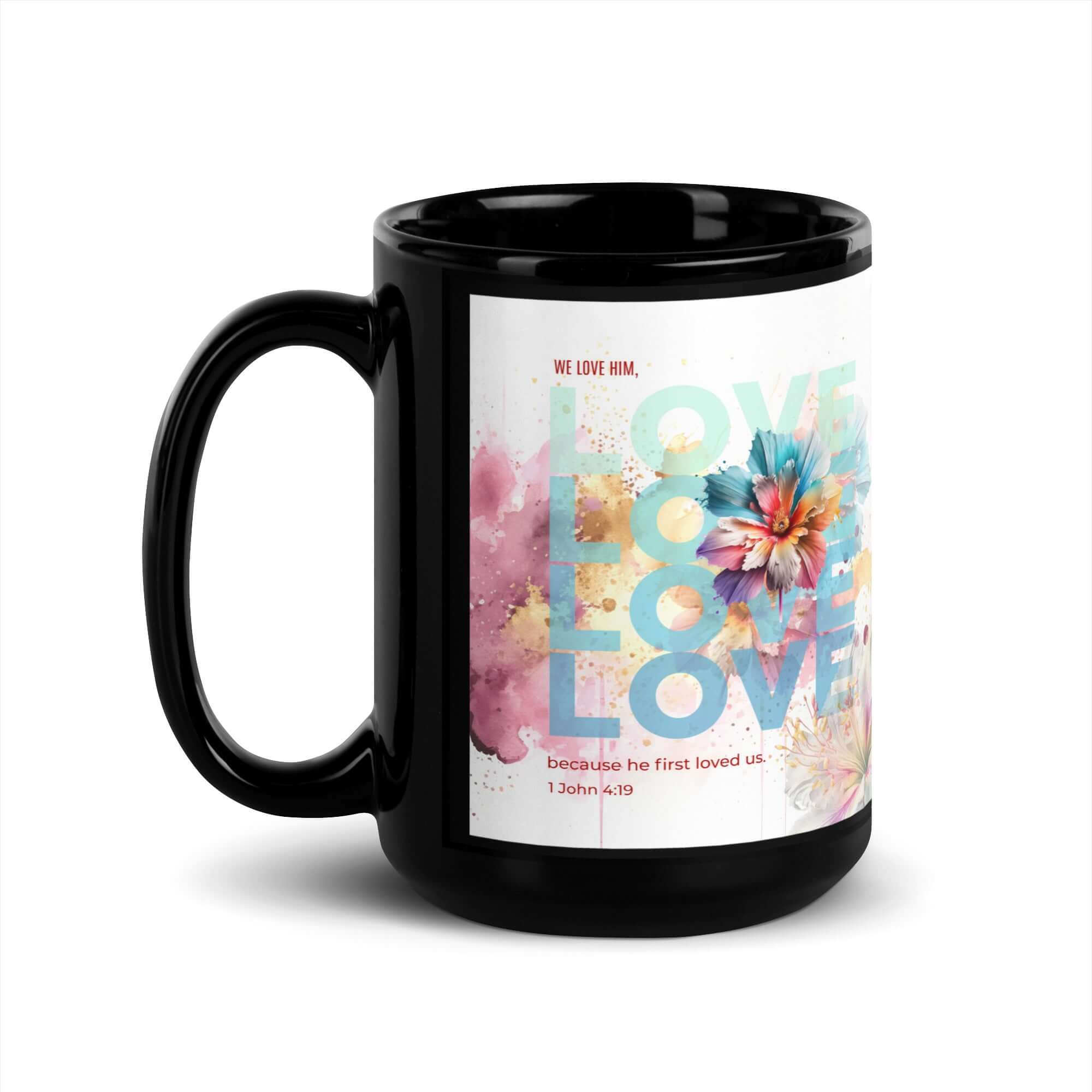 1 John 4:19 Bible Verse, We Love Him Black Glossy Mug 15 oz